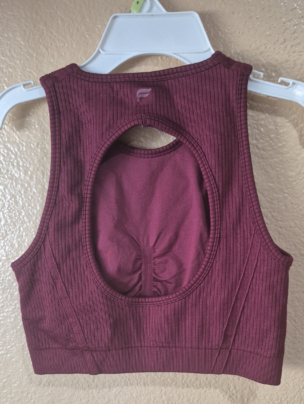 Fabletics Ribbed Open-Back Sports Bra in Wine